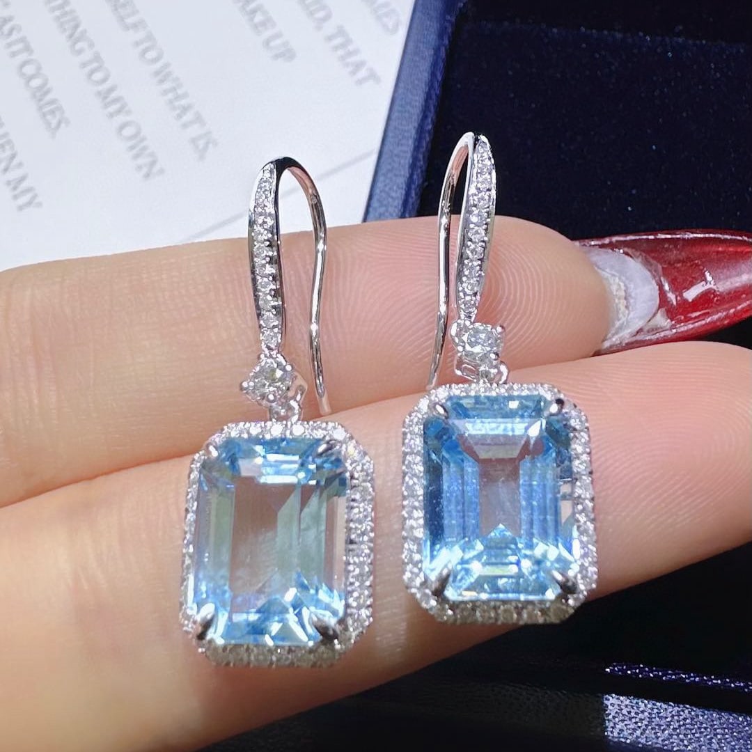 14k Gold 7.43 Ctw Natural Aquamarine & Diamond Earrings: Ref:230952012 // gold content:14k gold // main gemstone:aquamarine // shape:octagonal // carat weight:6. 93ct // color:santa maria color // treatment:natural // // adjacent gemstone 2 : diamond // sha
