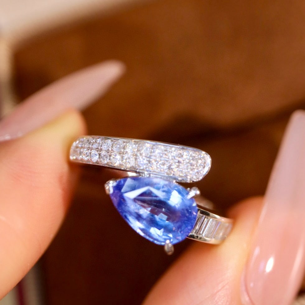 14k Gold 2.32 Ctw Natural Sapphire & Diamond Ring: Ref:230952075 // gold content:14k gold // ring size:7. 25us // // main gemstone:sapphire // shape:pear // carat weight:2. 03ct // color:blue // treatment:natural // // adjacent gemstone 2 :