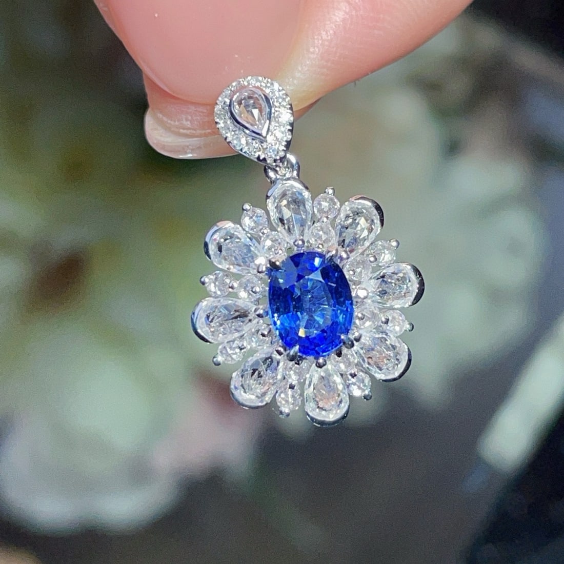 14k Gold 1.1 Ct Natural Sapphire & Diamond & Sapphire Pendant( Without Chain ): Ref:230952101 // gold content:14k gold // main gemstone:sapphire // shape:oval // carat weight:1. 1ct // color:blue // treatment:natural // // adjacent gemstone 2 : diamond // number of stones:12