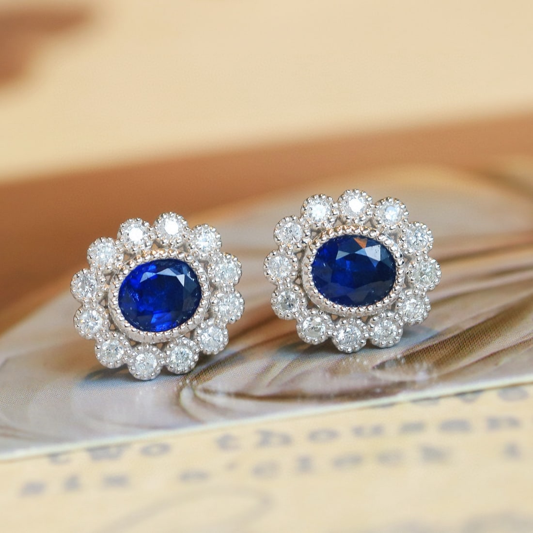14k Gold 2.18 Ctw Natural Sapphire & Diamond Earrings: Ref:230952146 // gold content:14k gold // main gemstone:sapphire // shape:oval // carat weight:1. 70ct // color:royal blue // treatment:natural // // adjacent gemstone 2 : diamond // shape:round //