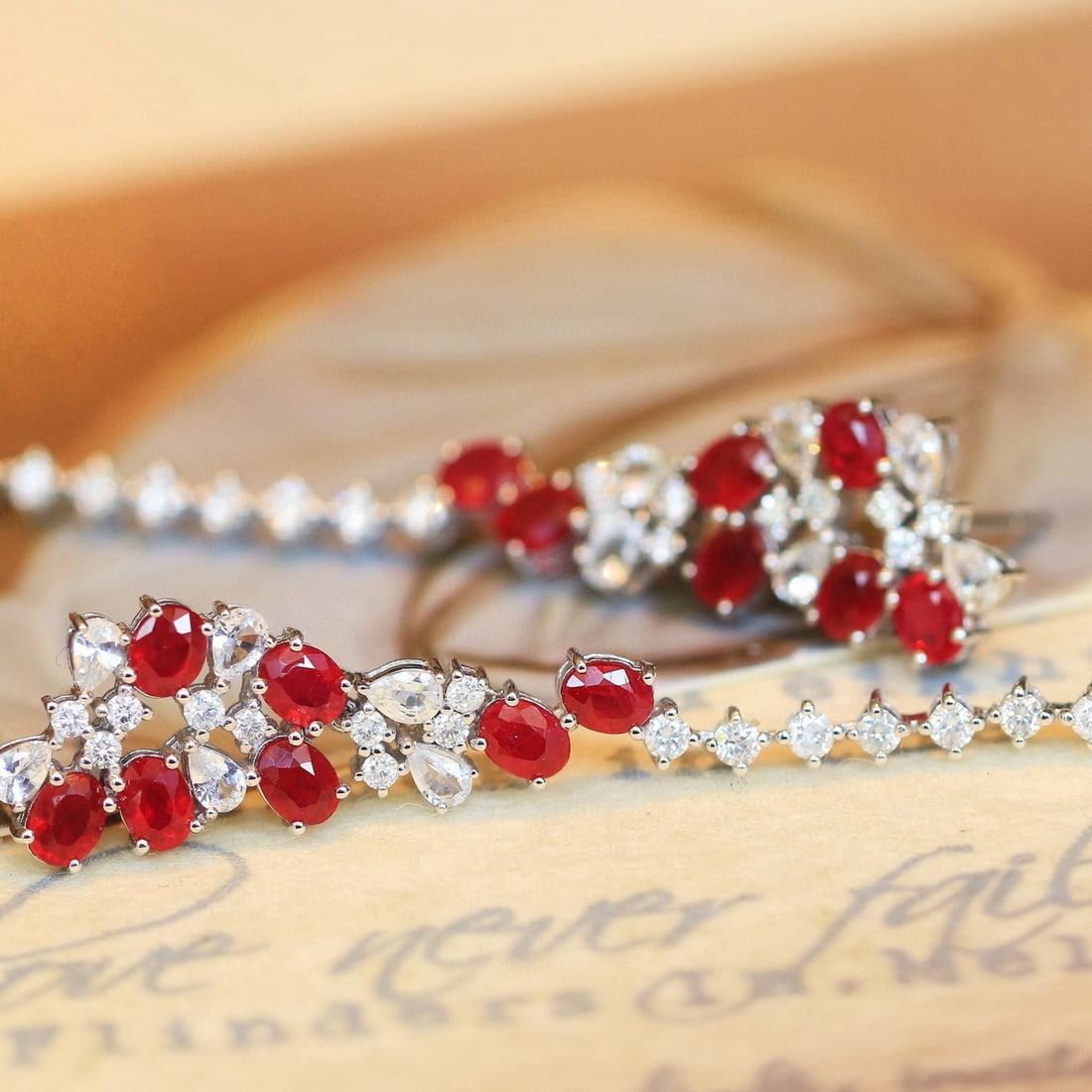 14k Gold 3.34 Ctw Natural Ruby & Sapphire Earrings: Ref:230952175 // gold content:14k gold // main gemstone:ruby // shape:oval // carat weight:2. 44ct // color:pigeonblood red // treatment:natural // // adjacent gemstone 2 : sapphire // shape:multiply