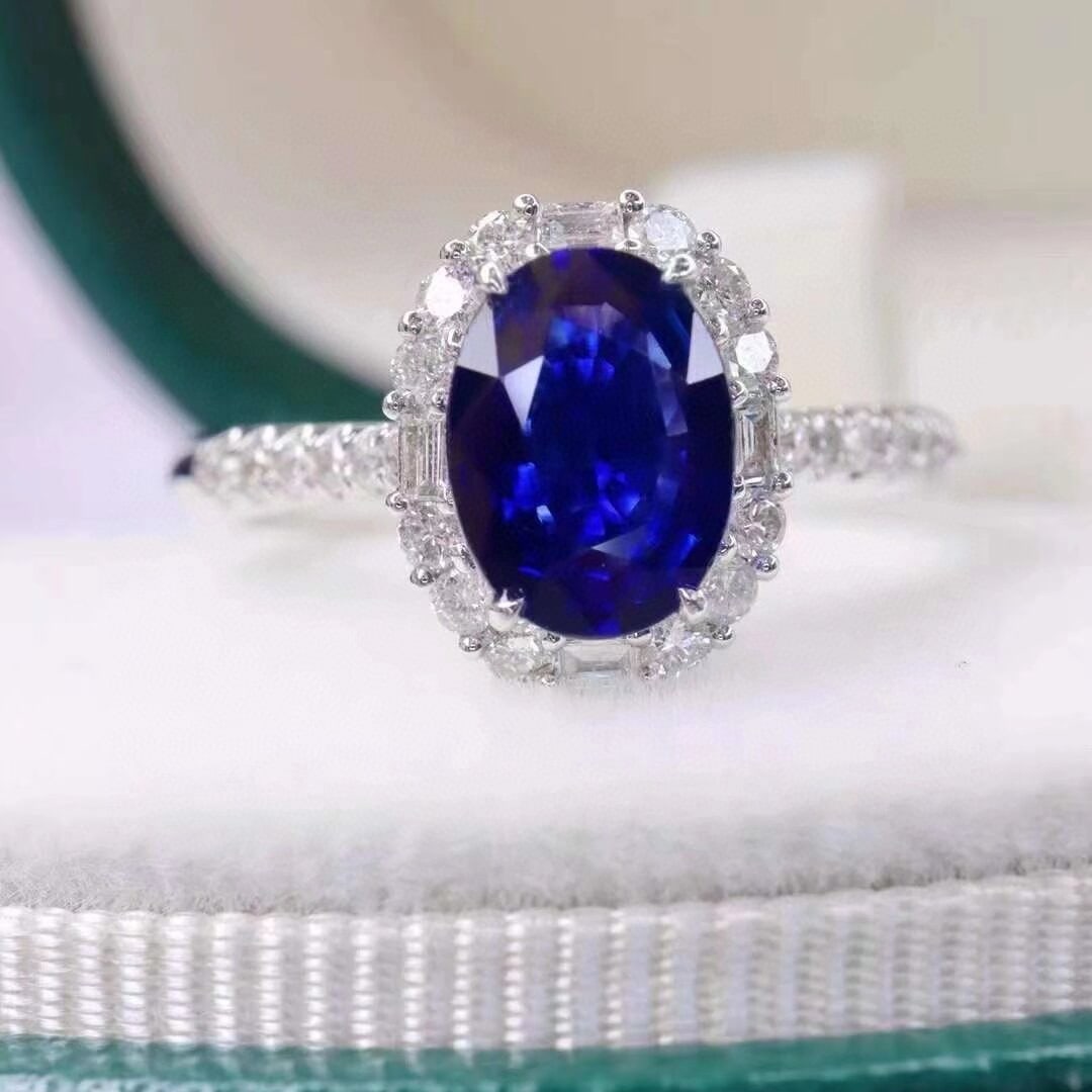 14k Gold 1.70 Ctw Natural Sapphire & Diamond Ring: Ref:230952188 // gold content:14k gold // ring size:7. 25us // // main gemstone:sapphire // shape:oval // carat weight:1. 35ct // color:royal blue // treatment:natural // // adjacent gemstone 2 :