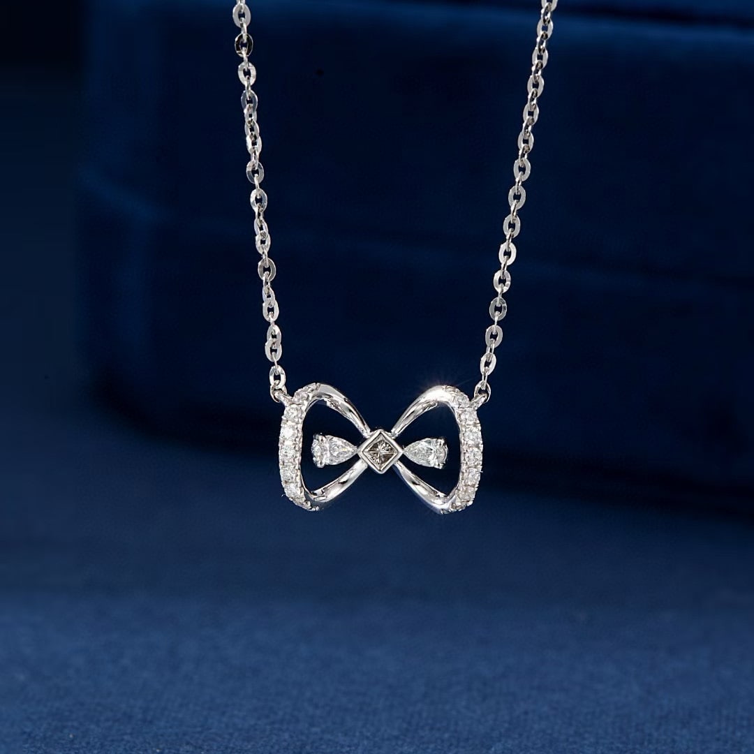 14k Gold 0.14 Ctw Natural H Diamond Necklace: Ref:230952201 // gold content:14k gold // main gemstone:diamond // shape:pear // carat weight:0. 07ct // clarity grade:vs-si // color:h // treatment:natural // // adjacent gemstone 2 : diamond //