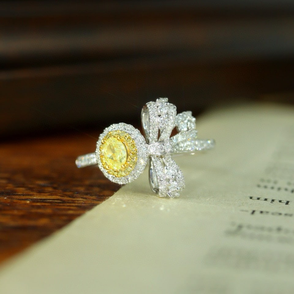 14k Gold 0.57 Ctw Natural Yellow Diamond & Diamond Ring: Ref:230952273 // gold content:14k gold // ring size:7. 25us // // main gemstone:yellow diamond // shape:oval // carat weight:0. 21ct // color:yellow // treatment:natural // // adjacent gemstone 2 : di