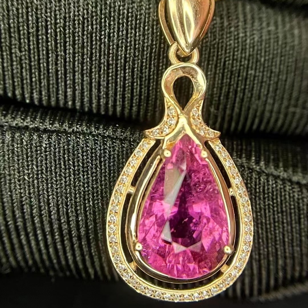 14k Gold 3.46 Ct Natural Tourmaline & Diamond Pendant( Without Chain ): Ref:230952337 // gold content:14k gold // main gemstone:tourmaline // shape:pear // carat weight:3. 46ct // color:red // treatment:natural // // adjacent gemstone 2 : diamond // number of stones:50