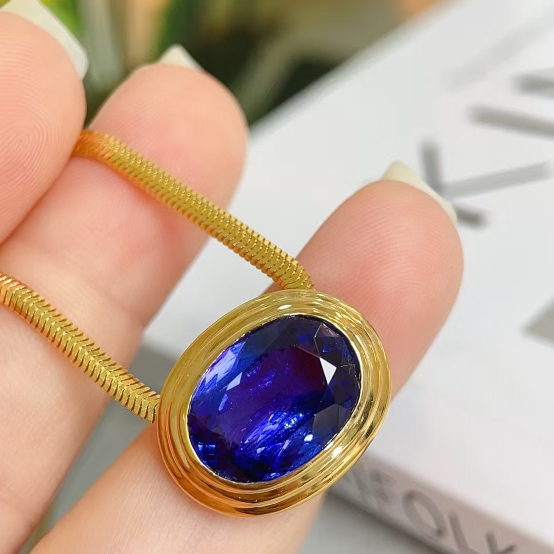 14k Gold 7.46 Ct Natural Tanzanite Pendant( Without Chain ): Ref:230952389 // gold content:14k gold // main gemstone:tanzanite // shape:oval // carat weight:7. 46ct // color:blue // treatment:natural // High Estimate: 50000 Condition: New Low Estimate: 33000