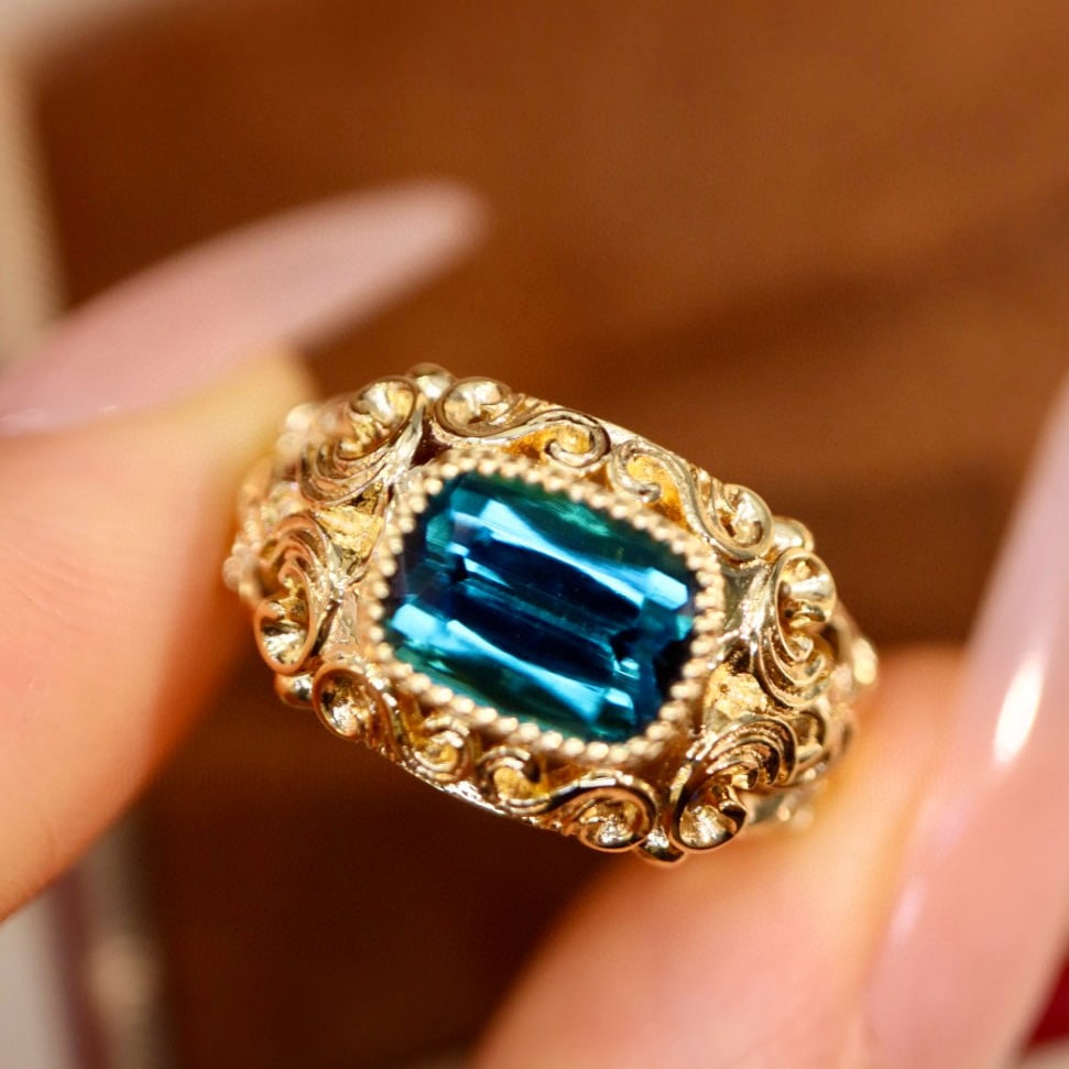 14k Gold 2.01 Ct Natural Tourmaline Ring: Ref:230952424 // gold content:14k gold // ring size:7. 25us // // main gemstone:tourmaline // shape:cushion // carat weight:2. 01ct // color:blue // treatment:natural // Low Estimate: 9200 Condition: