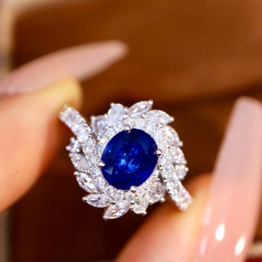 14k Gold 2.31 Ctw Vivid Blue Natural Sapphire & Diamond Ring: Ref:230952428 // gold content:14k gold // ring size:7. 25us // // main gemstone:sapphire // shape:oval // carat weight:1. 50ct // color:vivid blue // treatment:natural // // adjacent gemstone 2 : diam