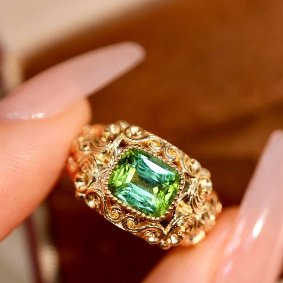 14k Gold 1.38 Ct Natural Tourmaline Ring: Ref:230952439 // gold content:14k gold // ring size:7. 25us // // main gemstone:tourmaline // shape:cushion // carat weight:1. 38ct // color:green // treatment:natural // Condition: New Low Estimate: