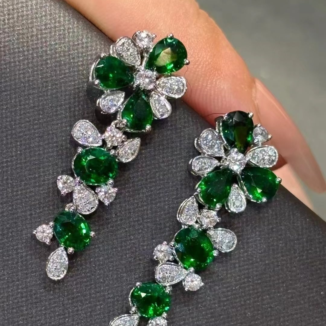 14k Gold 4.21 Ct Vivid Green Natural Tsavorite & Diamond Earrings: Ref:230953025 // gold content:14k gold // main gemstone:tsavorite // shape:multiply // carat weight:4. 21ct // color:vivid green // treatment:natural // // adjacent gemstone 2 : diamond //