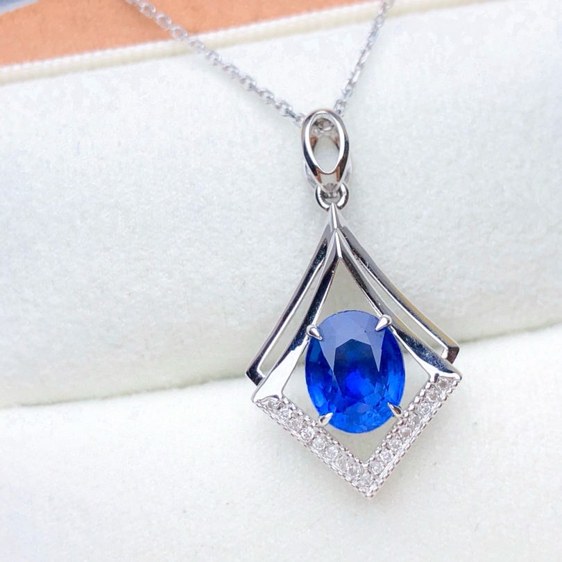 14k Gold 1.60 Ctw Vivid Blue Natural Sapphire & Diamond Pendant( Without Chain ): Ref:230953058 // gold content:14k gold // main gemstone:sapphire // shape:oval // carat weight:1. 53ct // color:vivid blue // treatment:natural // // adjacent gemstone 2 : diamond // shape:round // ca