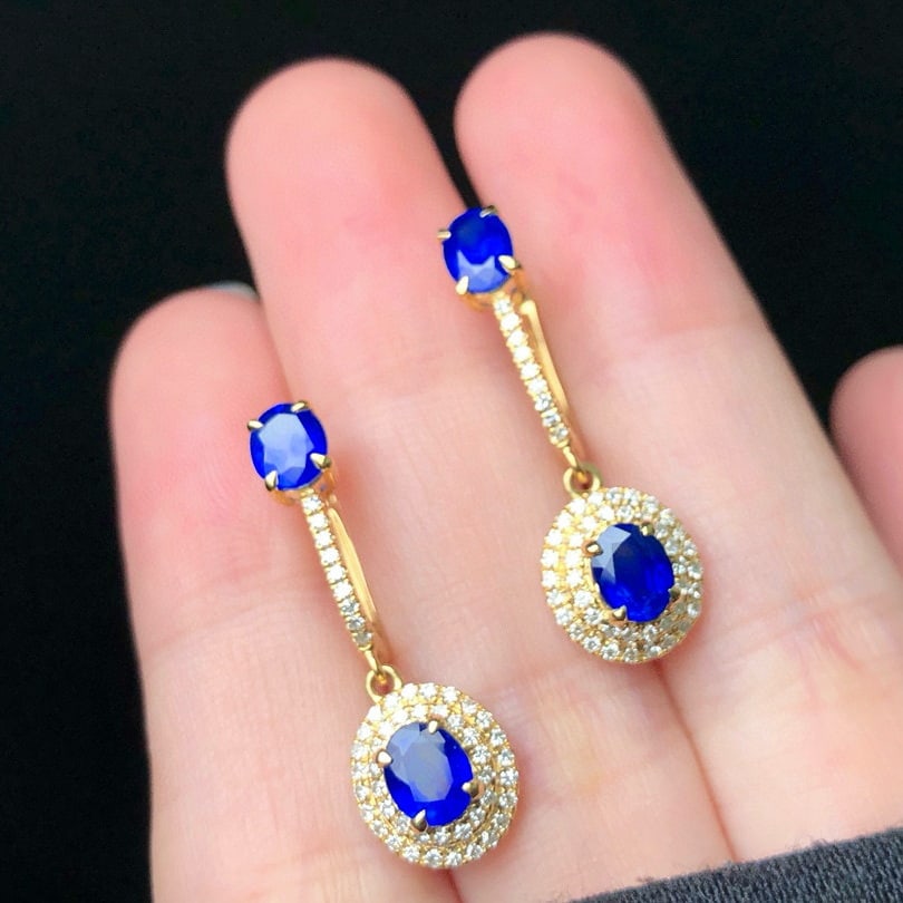 14k Gold 2.23 Ctw Natural Sapphire & Diamond Earrings: Ref:230953060 // gold content:14k gold // main gemstone:sapphire // shape:oval // carat weight:1. 82ct // color:royal blue // treatment:natural // // adjacent gemstone 2 : diamond // shape:round //