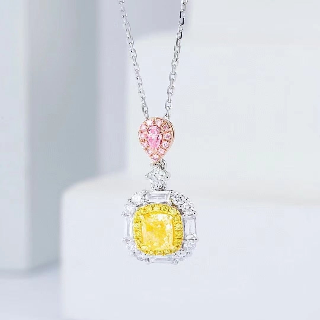 14k Gold 0.56 Ctw Natural Yellow Diamond & Pink Diamond Necklace: Ref:230953077 // gold content:14k gold // main gemstone:yellow diamond // shape:cushion // carat weight:0. 51ct // color:yellow // treatment:natural // // adjacent gemstone 2 : pink diamond //