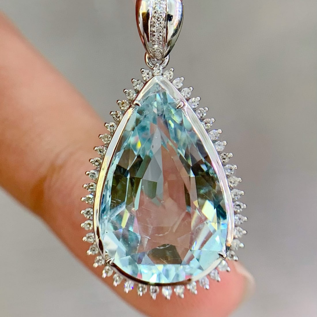 14k Gold 10.2 Ct Natural Aquamarine & Diamond Pendant( Without Chain ): Ref:230953115 // gold content:14k gold // main gemstone:aquamarine // shape:pear // carat weight:10. 2ct // color:blue // treatment:natural // // adjacent gemstone 2 : diamond // number of stones:53 /