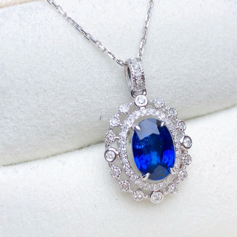 14k Gold 2.11 Ctw Natural Sapphire & Diamond Pendant( Without Chain ): Ref:230953126 // gold content:14k gold // main gemstone:sapphire // shape:oval // carat weight:1. 89ct // color:royal blue // treatment:natural // // adjacent gemstone 2 : diamond // shape:round // ca