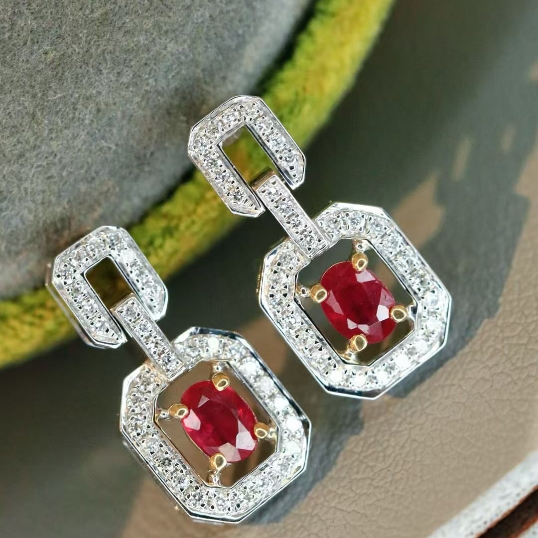 14k Gold 0.48 Ctw Vivid Red Natural Ruby & Diamond Earrings: Ref:230953142 // gold content:14k gold // main gemstone:ruby // shape:oval // carat weight:0. 3ct // color:vivid red // treatment:natural // // adjacent gemstone 2 : diamond // shape:round // carat