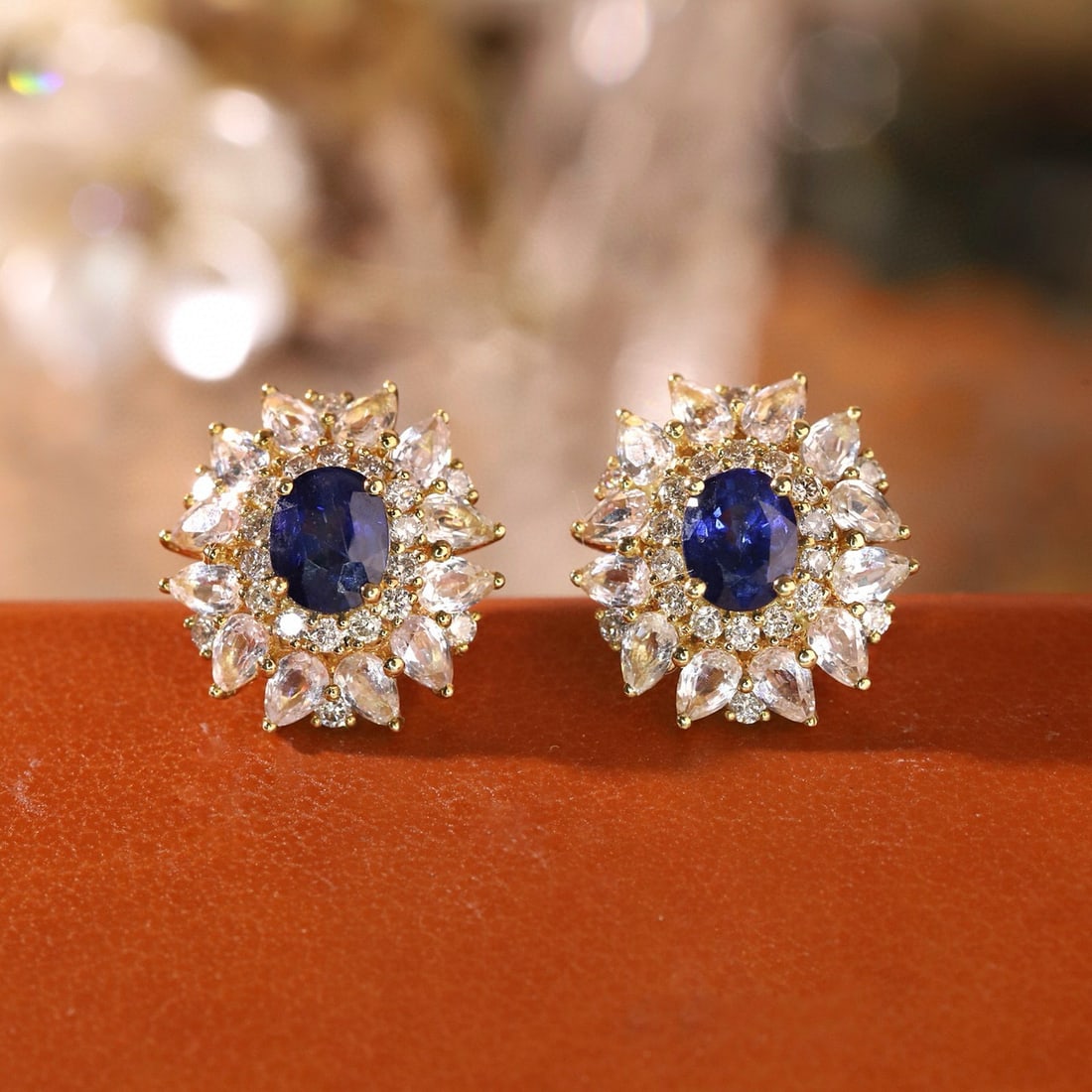 14k Gold 3.16 Ctw Natural Sapphire & Sapphire Earrings: Ref:230953157 // gold content:14k gold // main gemstone:sapphire // shape:oval // carat weight:1. 16ct // color:blue // treatment:natural // // adjacent gemstone 2 : sapphire // shape:pear // carat we
