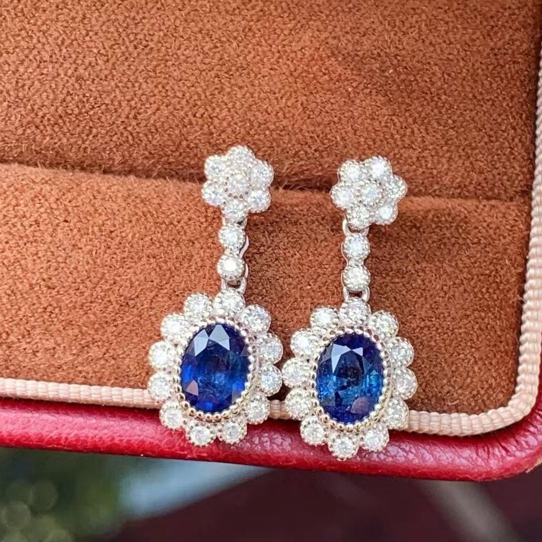 14k Gold 2.51 Ctw Natural Sapphire & Diamond Earrings: Ref:230953204 // gold content:14k gold // main gemstone:sapphire // shape:oval // carat weight:2. 00ct // color:blue // treatment:natural // // adjacent gemstone 2 : diamond // shape:round // carat