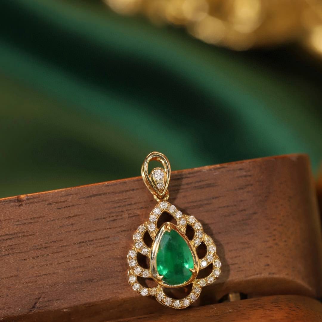 14k Gold 0.49 Ctw Natural Emerald & Diamond Pendant( Without Chain ): Ref:230953229 // gold content:14k gold // main gemstone:emerald // shape:pear // carat weight:0. 37ct // color:green // treatment:natural // // adjacent gemstone 2 : diamond // shape:round // carat