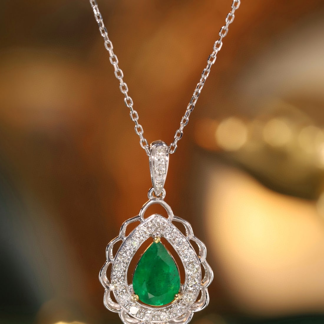 14k Gold 1.03 Ctw Natural Emerald & Diamond Pendant( Without Chain ): Ref:230953245 // gold content:14k gold // main gemstone:emerald // shape:pear // carat weight:0. 32ct // color:green // treatment:natural // // adjacent gemstone 2 : diamond // shape:round // carat we