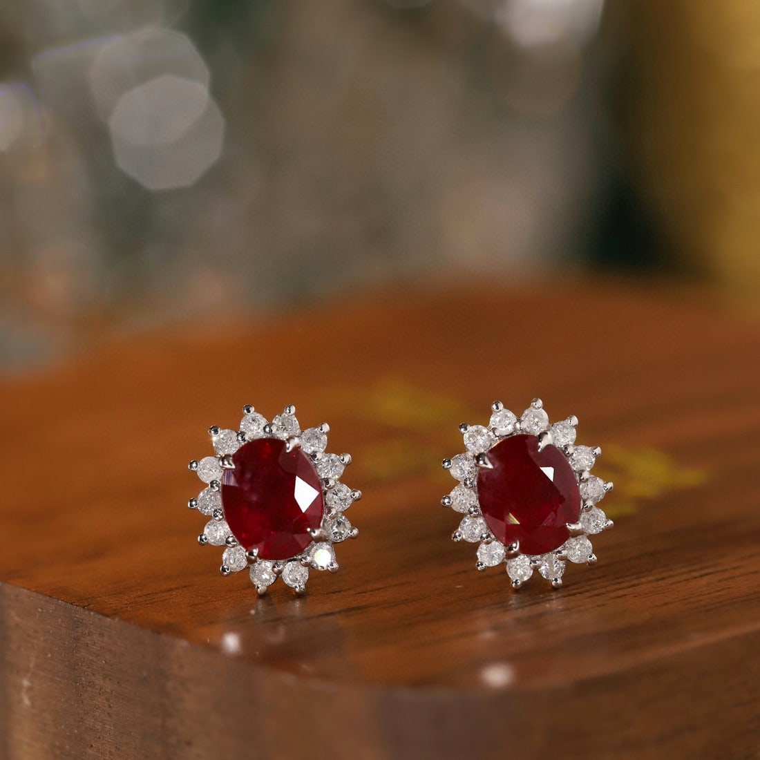 14k Gold 1.2 Ctw Natural Ruby & Diamond Earrings: Ref:230953252 // gold content:14k gold // main gemstone:ruby // shape:oval // carat weight:1ct // color:red // treatment:natural // // adjacent gemstone 2 : diamond // shape:round // carat weight:0. 2