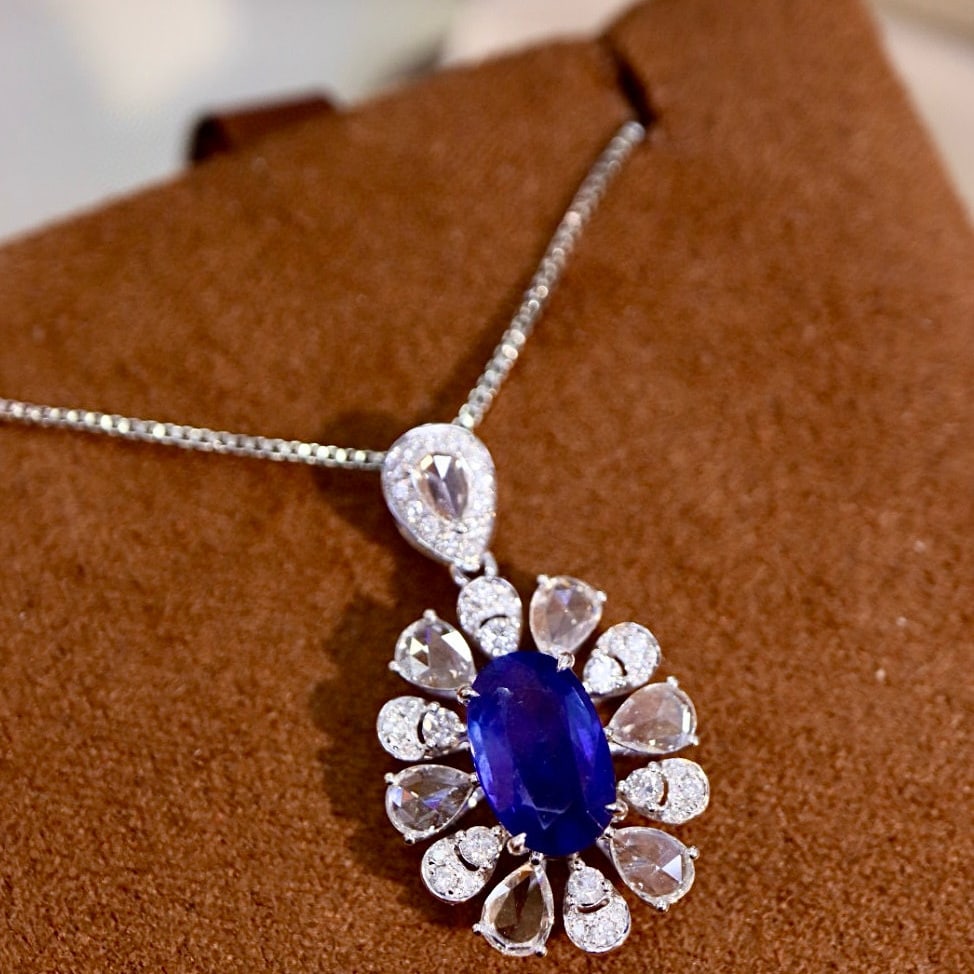 14k Gold 2.55 Ctw Natural Sapphire & Diamond Pendant( Without Chain ): Ref:230954031 // gold content:14k gold // main gemstone:sapphire // shape:oval // carat weight:1. 66ct // color:blue // treatment:natural // // adjacent gemstone 2 : diamond // shape:multiply // carat