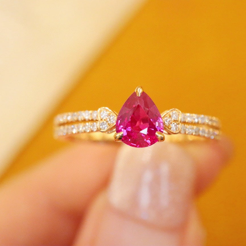 14k Gold 0.74 Ctw Natural Ruby & Diamond Ring: Ref:230954093 // gold content:14k gold // ring size:7. 25us // // main gemstone:ruby // shape:pear // carat weight:0. 60ct // color:red // treatment:natural // // adjacent gemstone 2 : diamond // numb