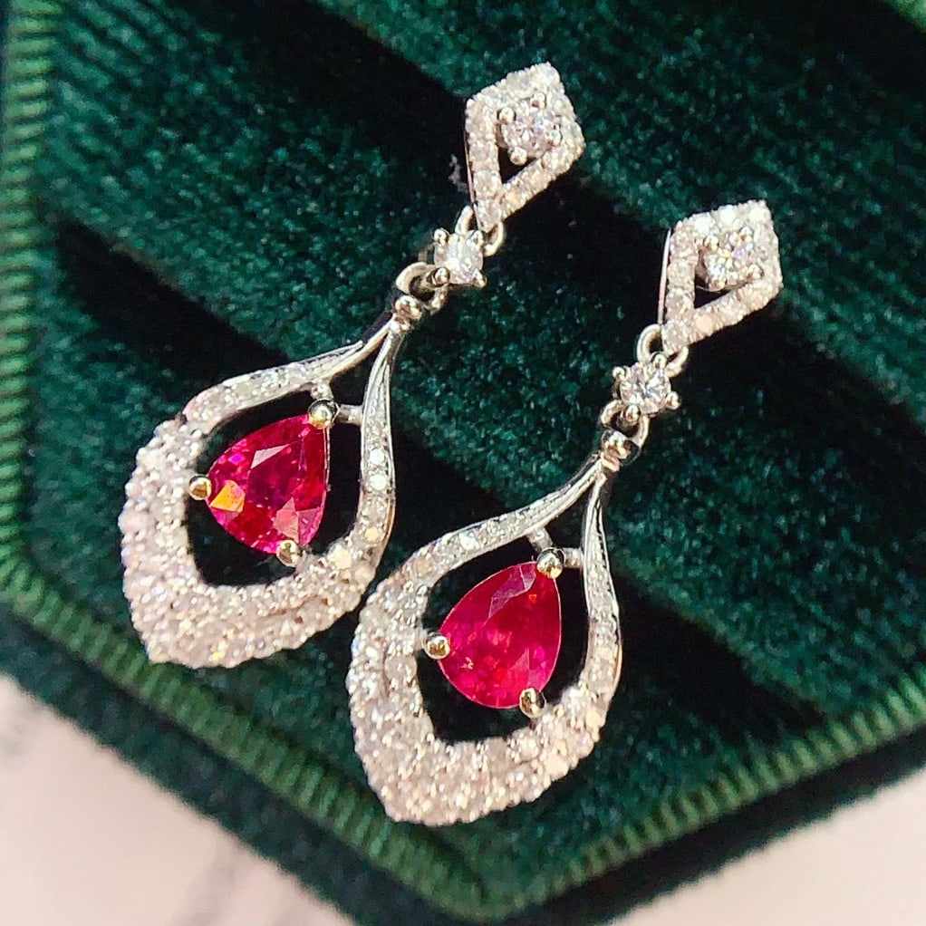 14k Gold 1 Ct Natural Ruby & Diamond Earrings: Ref:230954198 // gold content:14k gold // main gemstone:ruby // shape:pear // carat weight:1ct // color:red // treatment:natural // // adjacent gemstone 2 : diamond // number of stones:113 //