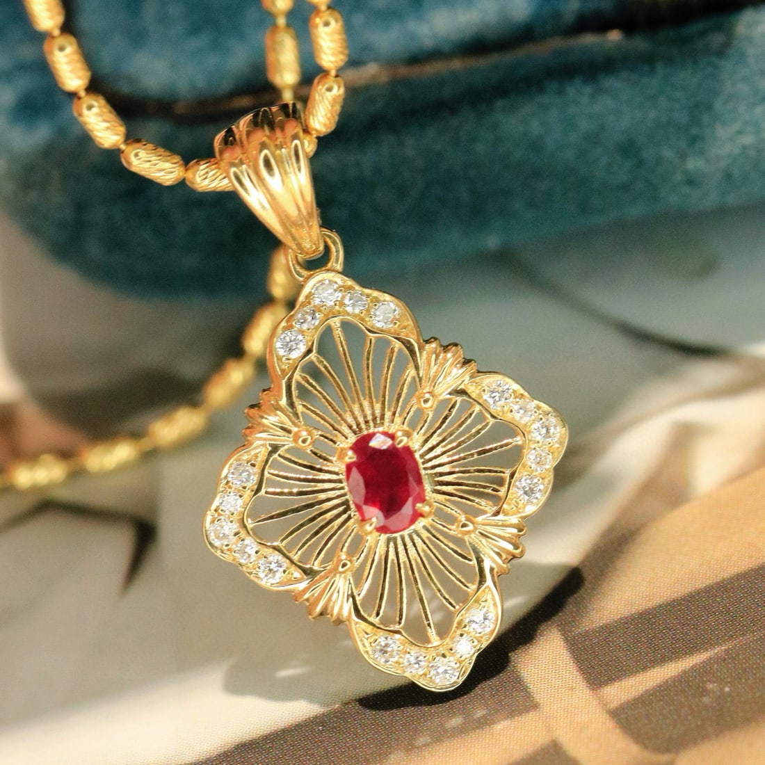 14k Gold 0.29 Ctw Natural Ruby & Diamond Pendant( Without Chain ): Ref:230954212 // gold content:14k gold // main gemstone:ruby // shape:oval // carat weight:0. 2ct // color:red // treatment:natural // // adjacent gemstone 2 : diamond // shape:round // carat weight:0