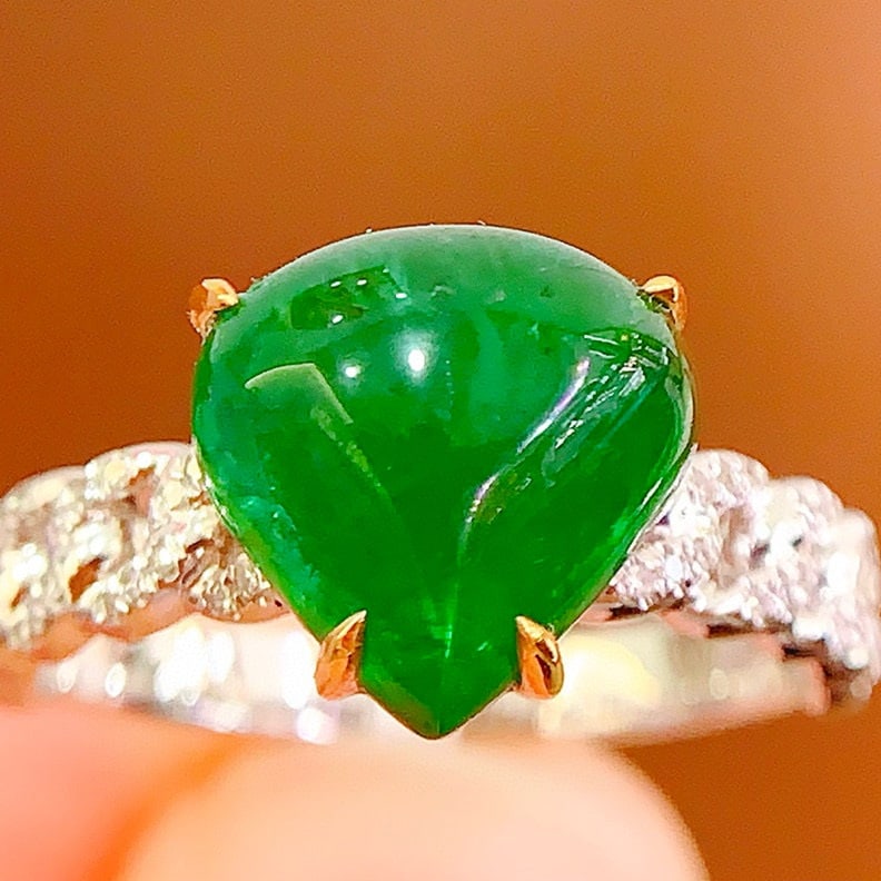 14k Gold 5.06 Ct Natural Emerald & Diamond Ring: Ref:230954230 // gold content:14k gold // ring size:7. 25us // // main gemstone:emerald // shape:pear // carat weight:5. 06ct // color:green // treatment:natural // // adjacent gemstone 2 : diamond //