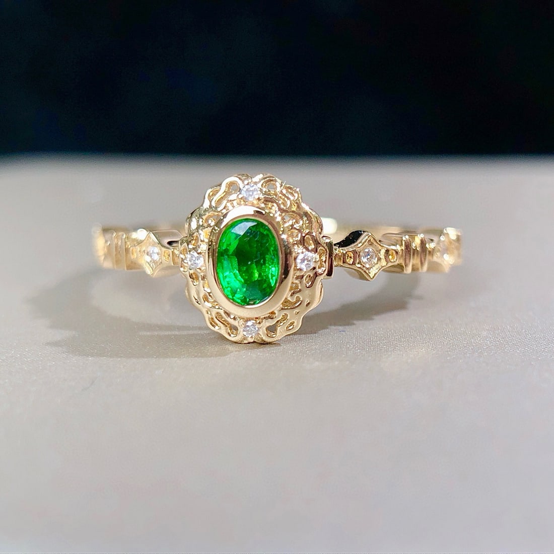 14k Gold 0.27 Ctw Vivid Green Natural Tsavorite & Diamond Ring: Ref:230954247 // gold content:14k gold // ring size:7. 25us // // main gemstone:tsavorite // shape:oval // carat weight:0. 25ct // color:vivid green // treatment:natural // // adjacent gemstone 2 : di