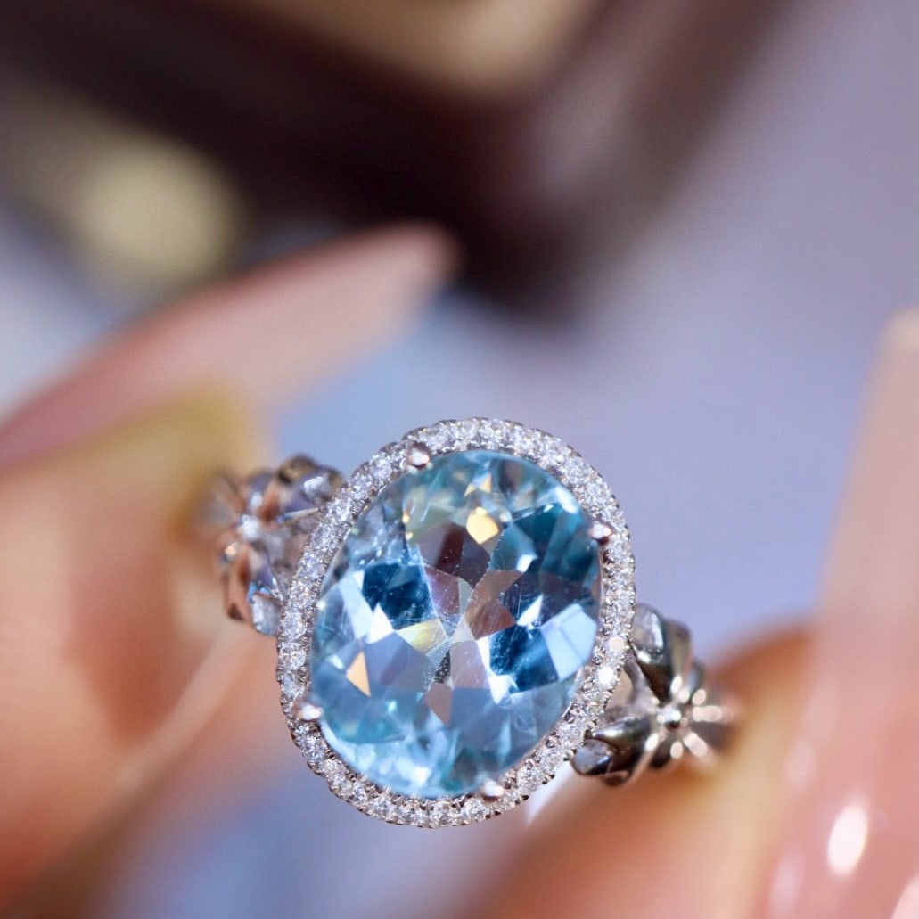 14k Gold 1.64 Ctw Natural Topaz & Diamond Ring: Ref:230954261 // gold content:14k gold // ring size:7. 25us // // main gemstone:topaz // shape:oval // carat weight:1. 50ct // color:blue // treatment:natural // // adjacent gemstone 2 : diamond // sh