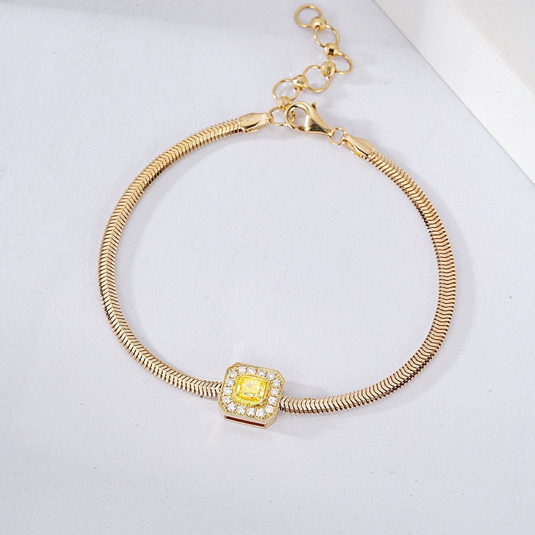14k Gold 0.51 Ctw Natural Yellow Diamond & Diamond Bracelet: Ref:230954289 // gold content:14k gold // main gemstone:yellow diamond // shape:cushion // carat weight:0. 35ct // color:yellow // treatment:natural // // adjacent gemstone 2 : diamond // shape:round