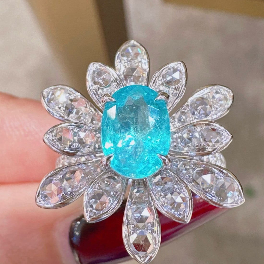 14k Gold 2.31 Ctw Natural Paraiba Tourmaline & Diamond Ring: Ref:230954347 // gold content:14k gold // ring size:7. 25us // // main gemstone:paraiba tourmaline // shape:oval // carat weight:1. 47ct // color:blue // treatment:natural // // adjacent gemstone