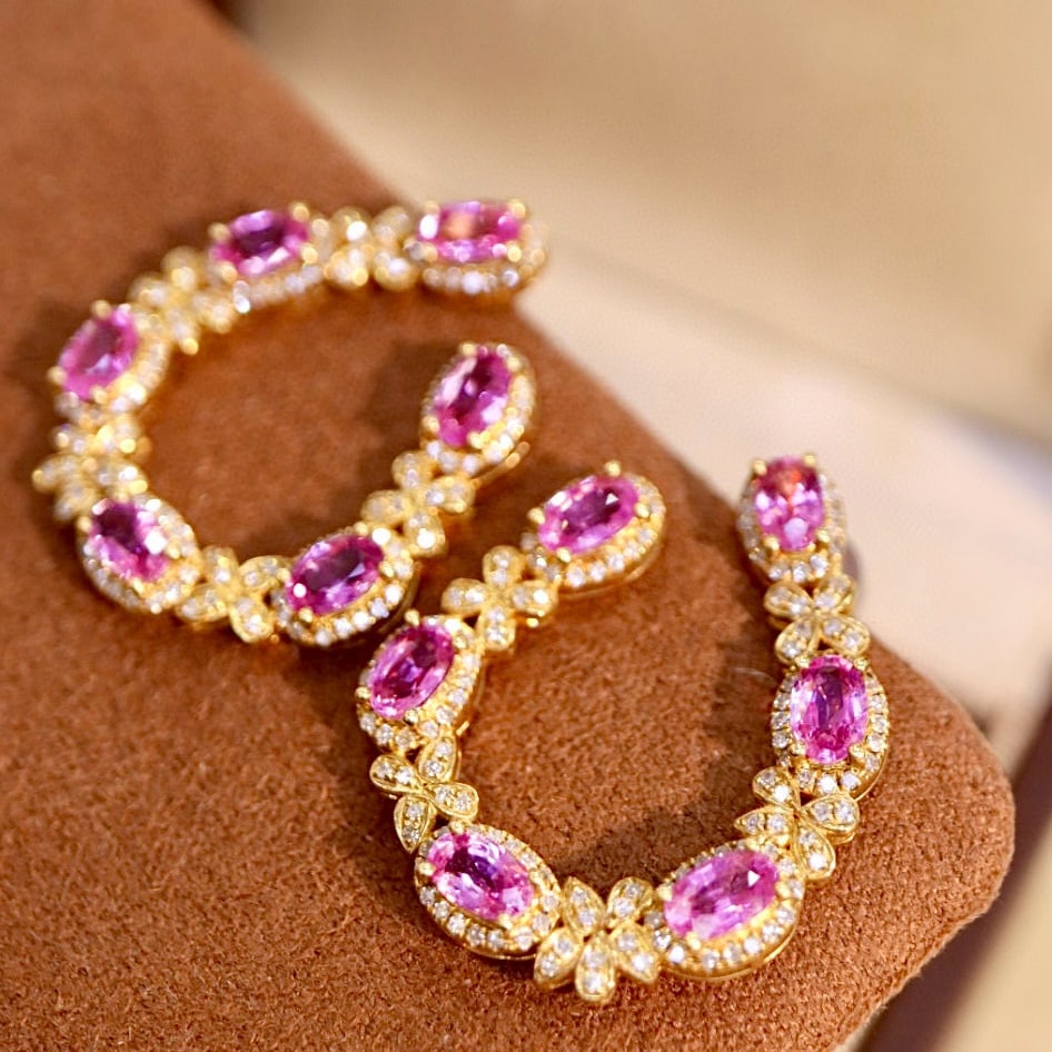 14k Gold 5.30 Ctw Natural Padparadscha Sapphire & Diamond Earrings: Ref:230954367 // gold content:14k gold // main gemstone:padparadscha sapphire // shape:oval // carat weight:4. 20ct // color:orangish pink // treatment:natural // // adjacent gemstone 2 : diamond