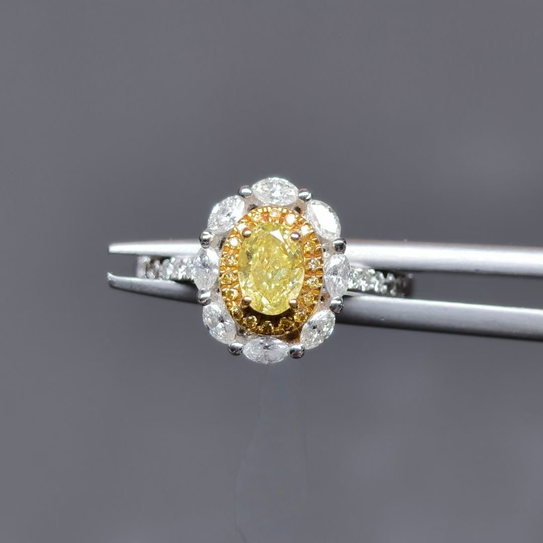 14k Gold 1.05 Ctw Natural Yellow Diamond & Diamond Ring: Ref:230954399 // gold content:14k gold // ring size:7. 25us // // main gemstone:yellow diamond // shape:oval // carat weight:0. 55ct // color:yellow // treatment:natural // // adjacent gemstone 2 : di