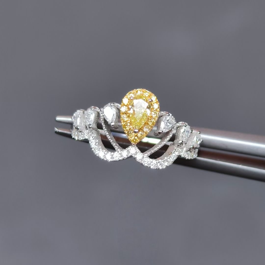 14k Gold 0.56 Ctw Natural Yellow Diamond & Diamond Ring: Ref:230954430 // gold content:14k gold // ring size:7. 25us // // main gemstone:yellow diamond // shape:pear // carat weight:0. 21ct // color:yellow // treatment:natural // // adjacent gemstone 2