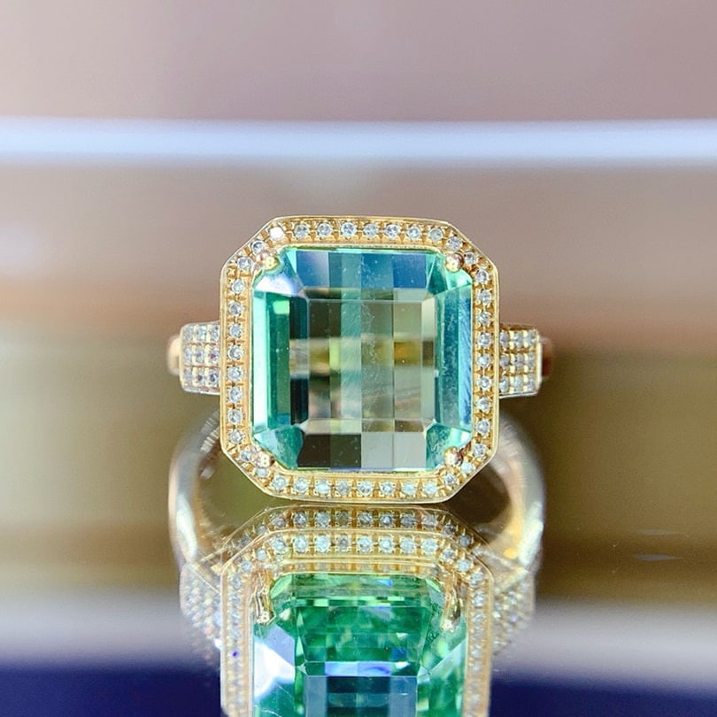 14k Gold 7.47 Ct Natural Tourmaline & Diamond Ring: Ref:230955025 // gold content:14k gold // ring size:7. 25us // // main gemstone:tourmaline // shape:octagonal // carat weight:7. 47ct // color:green // treatment:natural // // adjacent gemstone 2
