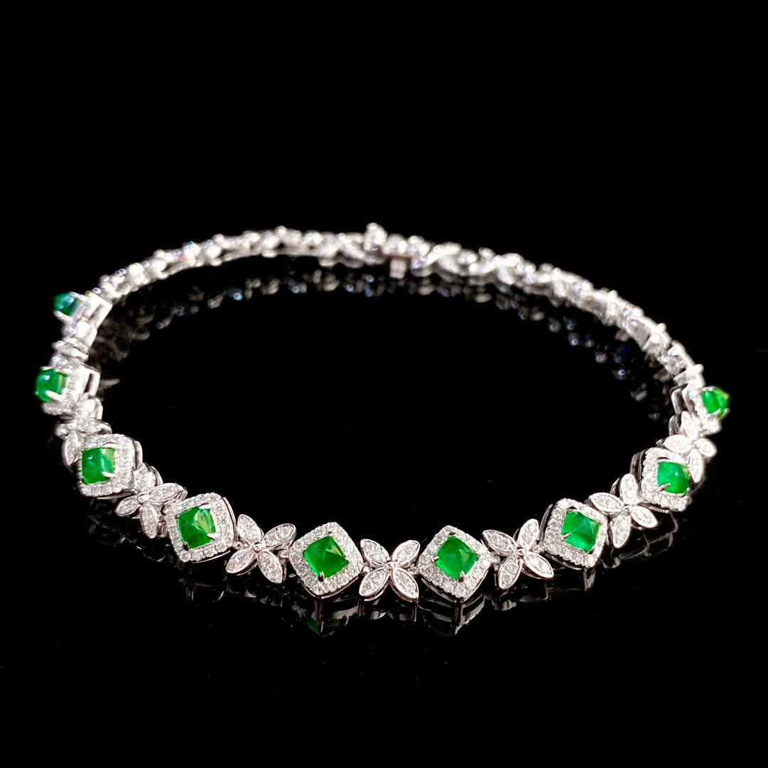 14k Gold 2.53 Ctw Vivid Green Natural Emerald & Diamond Bracelet: Ref:230955038 // gold content:14k gold // main gemstone:emerald // shape:suger-loaf // carat weight:1. 37ct // color:vivid green // treatment:natural // // adjacent gemstone 2 : diamond // shape:round