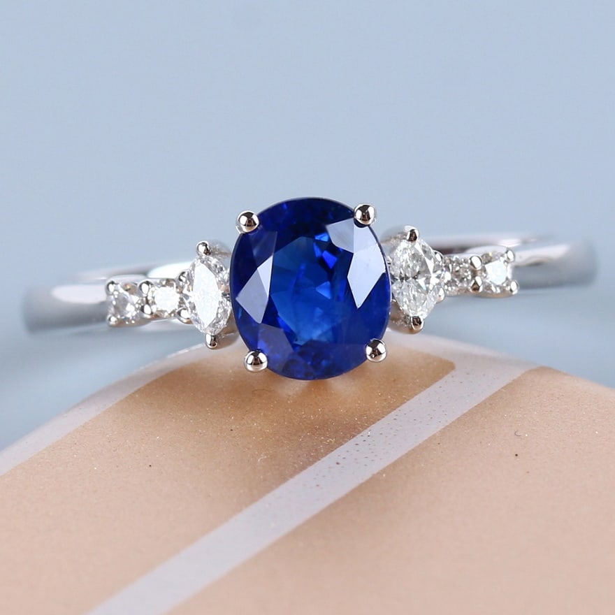 14k Gold 1.05 Ct Vivid Blue Natural Sapphire & Diamond Ring: Ref:230955048 // gold content:14k gold // ring size:7. 25us // // main gemstone:sapphire // shape:oval // carat weight:1. 05ct // color:vivid blue // treatment:natural // // adjacent gemstone 2 :