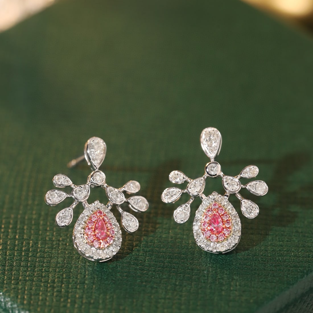 14k Gold 0.70 Ctw Natural Pink Diamond & Diamond Earrings: Ref:230955074 // gold content:14k gold // main gemstone:pink diamond // shape:pear // carat weight:0. 16ct // color:pink // treatment:natural // // adjacent gemstone 2 : diamond // shape:round // cara