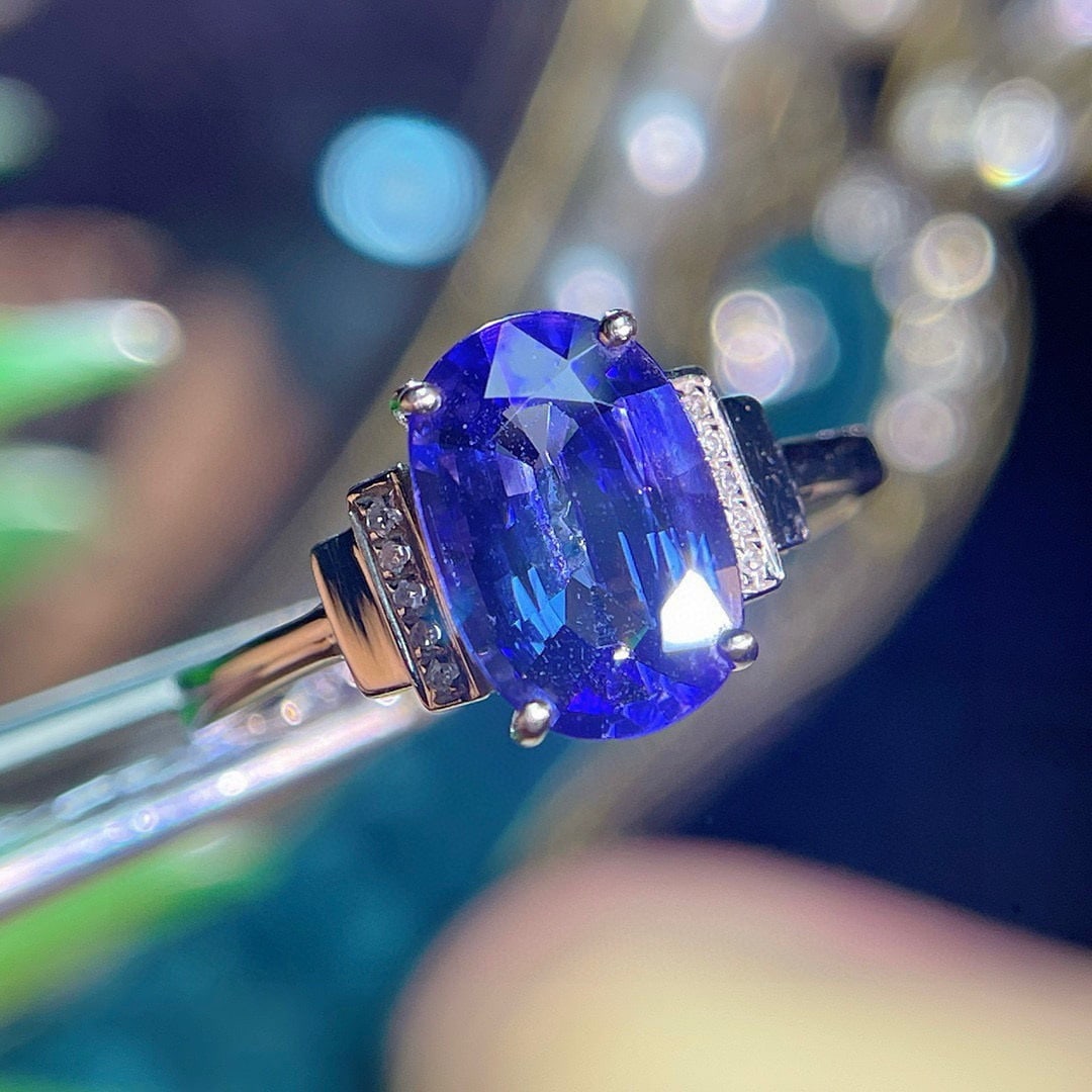 14k Gold 2.5 Ct Natural Tanzanite & Diamond Ring: Ref:230955079 // gold content:14k gold // ring size:7. 25us // // main gemstone:tanzanite // shape:oval // carat weight:2. 5ct // color:blue // treatment:natural // // adjacent gemstone 2 :