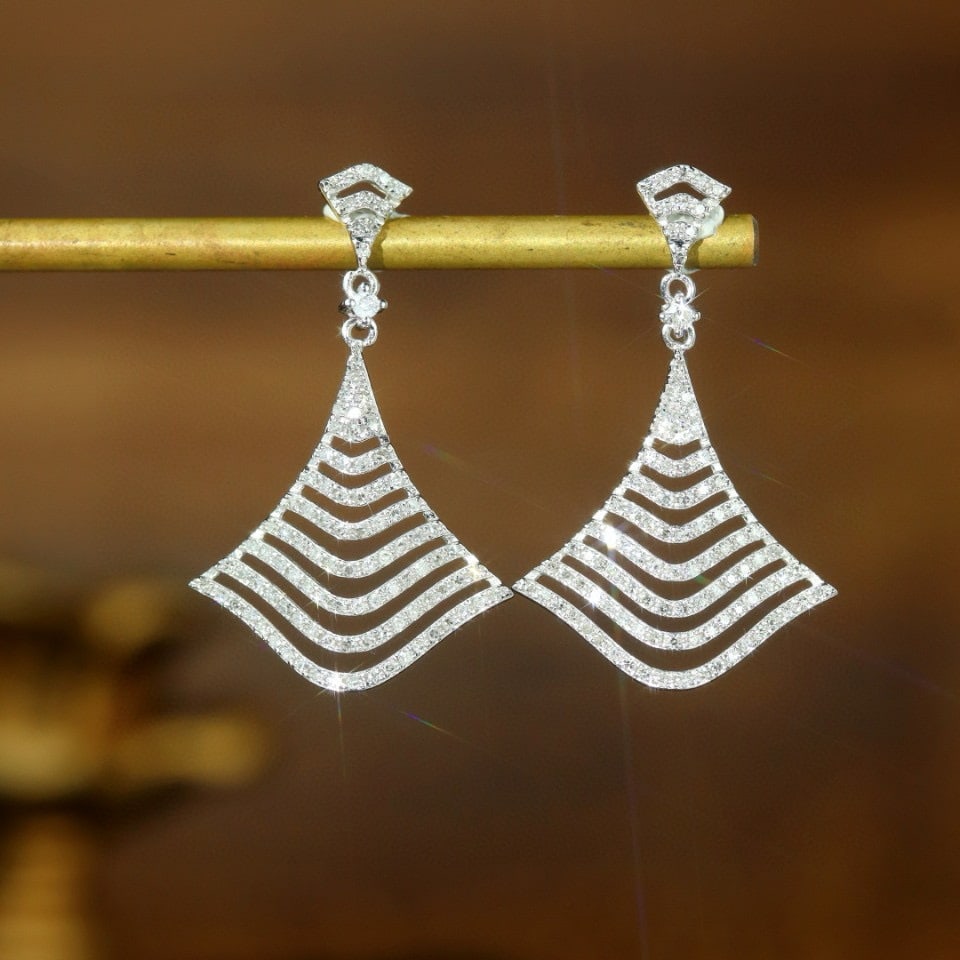 14k Gold 0.60 Ct Natural H Diamond Earrings: Ref:230955114 // gold content:14k gold // main gemstone:diamond // shape:round // carat weight:0. 60ct // clarity grade:vs-si // color:h // treatment:natural // cut grade:g // Condition: NewLow