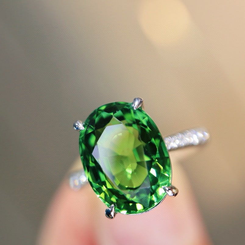 14k Gold 6.37 Ctw Natural Tourmaline & Diamond Ring: Ref:230955174 // gold content:14k gold // ring size:7. 25us // // main gemstone:tourmaline // shape:oval // carat weight:6. 20ct // color:green // treatment:natural // // adjacent gemstone 2 : diamond