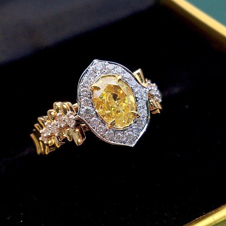 14k Gold 1.26 Ctw Natural Yellow Diamond & Diamond Ring: Ref:230955181 // gold content:14k gold // ring size:7. 25us // // main gemstone:yellow diamond // shape:oval // carat weight:1. 00ct // color:yellow // treatment:natural // // adjacent gemstone 2