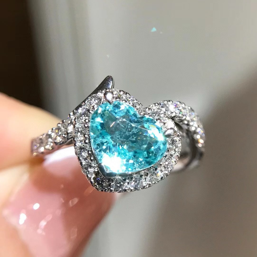 14k Gold 2.29 Ctw Natural Paraiba Tourmaline & Diamond Ring: Ref:230955187 // gold content:14k gold // ring size:7. 25us // // main gemstone:paraiba tourmaline // shape:heart // carat weight:1. 75ct // color:blue // treatment:natural // // adjacent gemstone