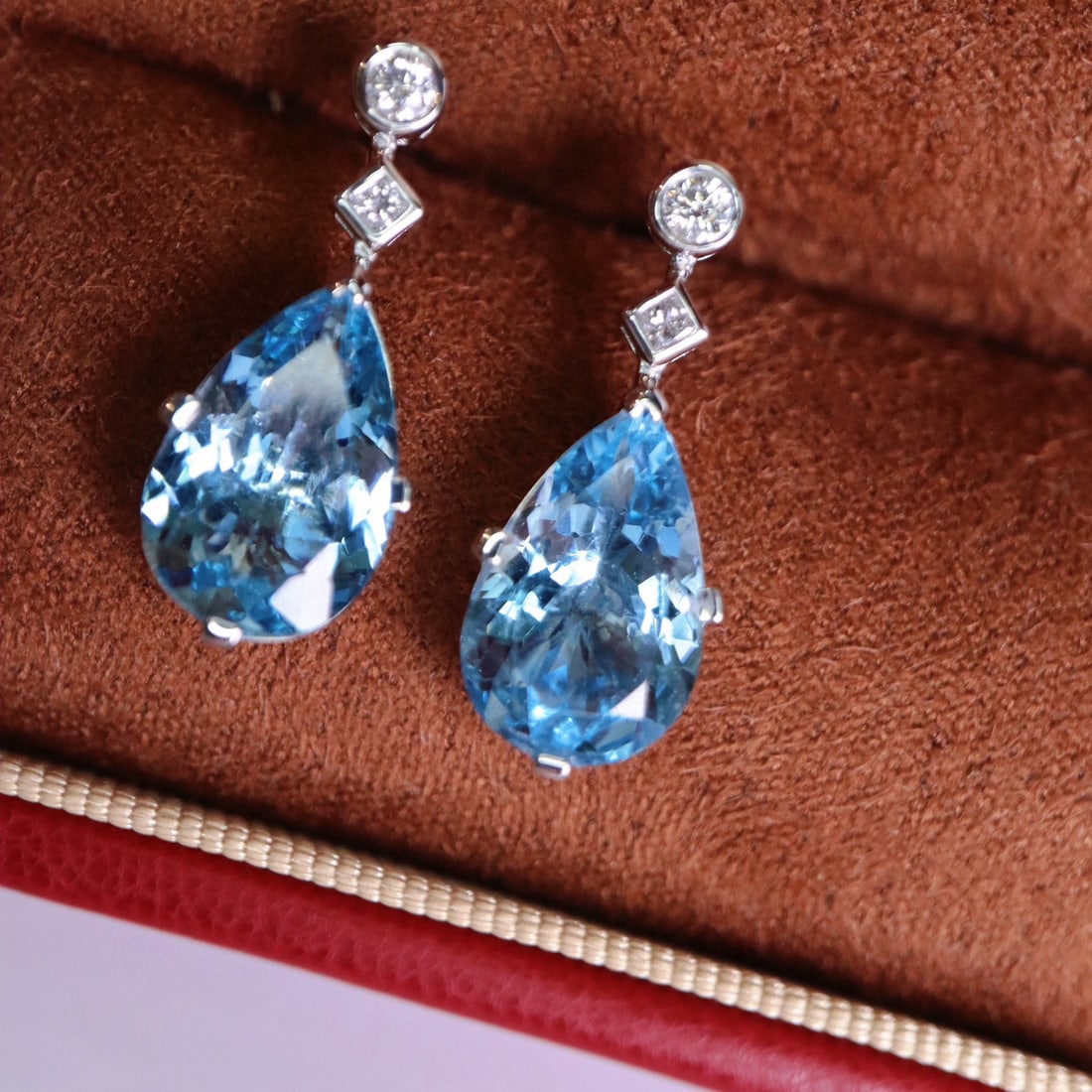 14k Gold 4.46 Ctw Natural Aquamarine & Diamond Earrings: Ref:230955192 // gold content:14k gold // main gemstone:aquamarine // shape:pear // carat weight:4. 30ct // color:santa maria color // treatment:natural // // adjacent gemstone 2 : diamond //