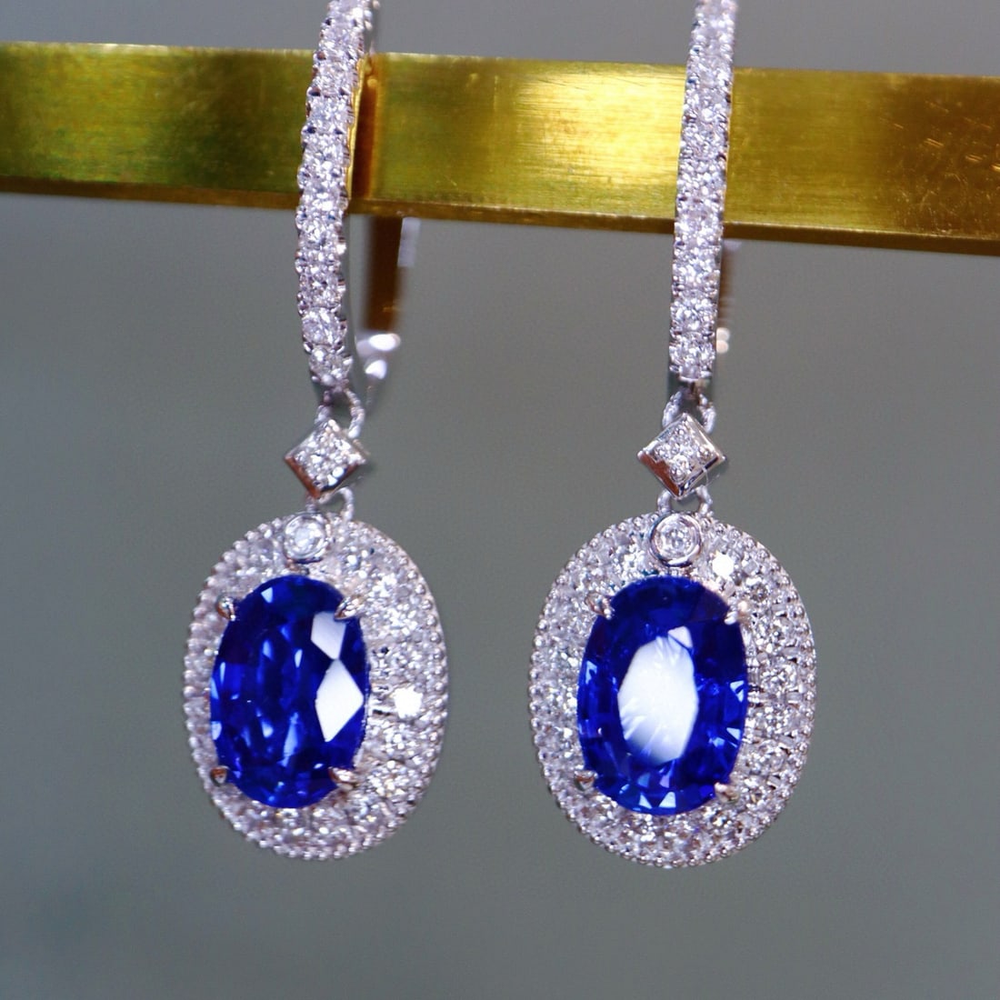 14k Gold 2.57 Ctw Natural Sapphire & Diamond Earrings: Ref:230955196 // gold content:14k gold // main gemstone:sapphire // shape:oval // carat weight:2. 16ct // color:royal blue // treatment:natural // // adjacent gemstone 2 : diamond // shape:round //