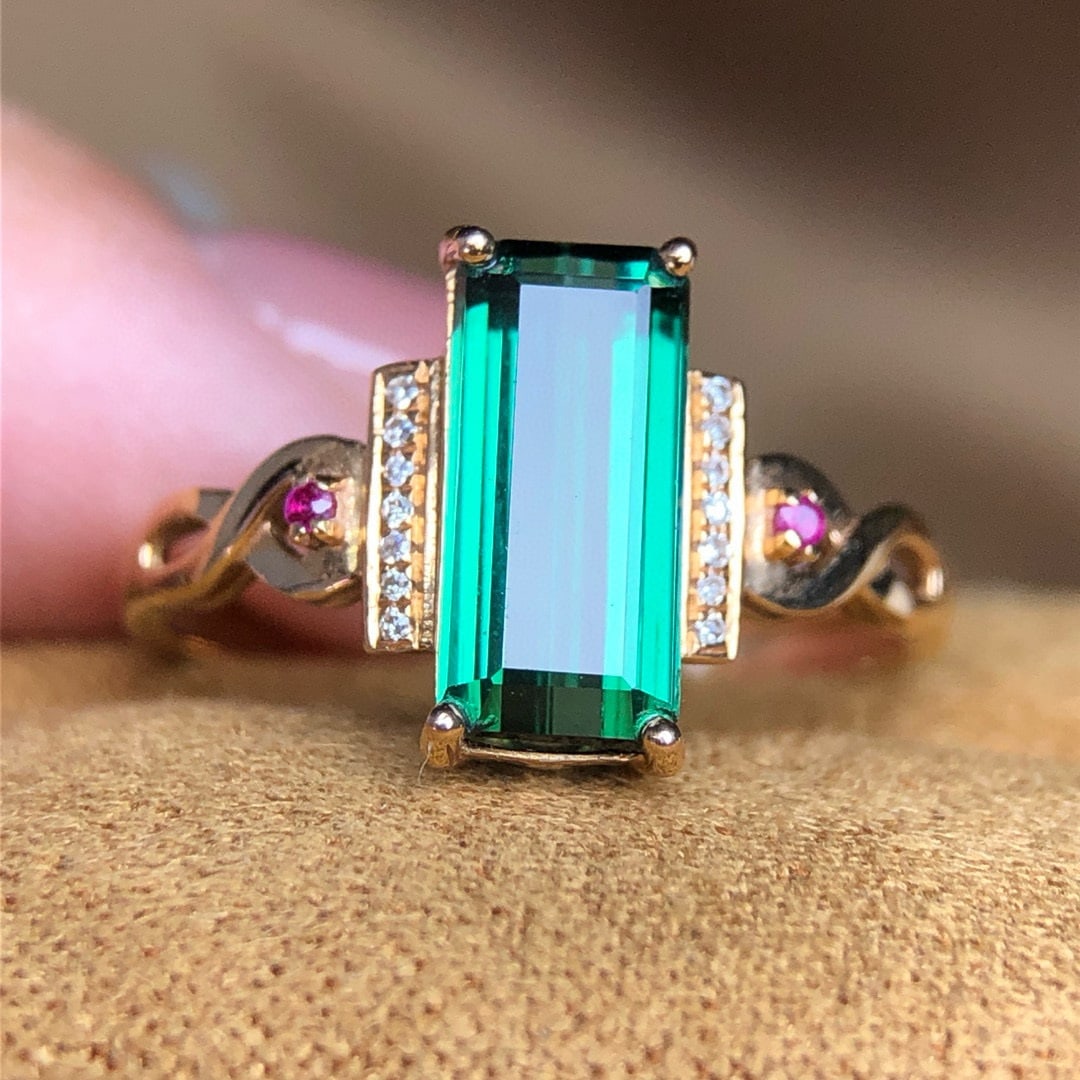 14k Gold 2.20 Ct Natural Tourmaline & Diamond Ring: Ref:230955201 // gold content:14k gold // ring size:7. 25us // // main gemstone:tourmaline // shape:octagonal // carat weight:2. 20ct // color:green // treatment:natural // // adjacent gemstone 2