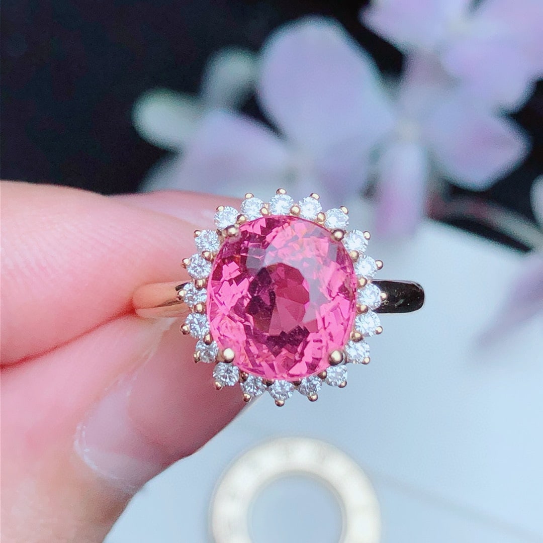 14k Gold 3.68 Ct Natural Tourmaline & Diamond Ring: Ref:230955212 // gold content:14k gold // ring size:7. 25us // // main gemstone:tourmaline // shape:oval // carat weight:3. 68ct // color:pink // treatment:natural // // adjacent gemstone 2 :